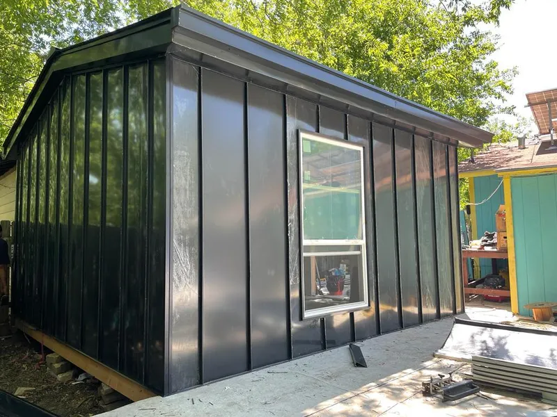 Black standing seam metal wall panels for Metal Roof Installation in North Richland Hills