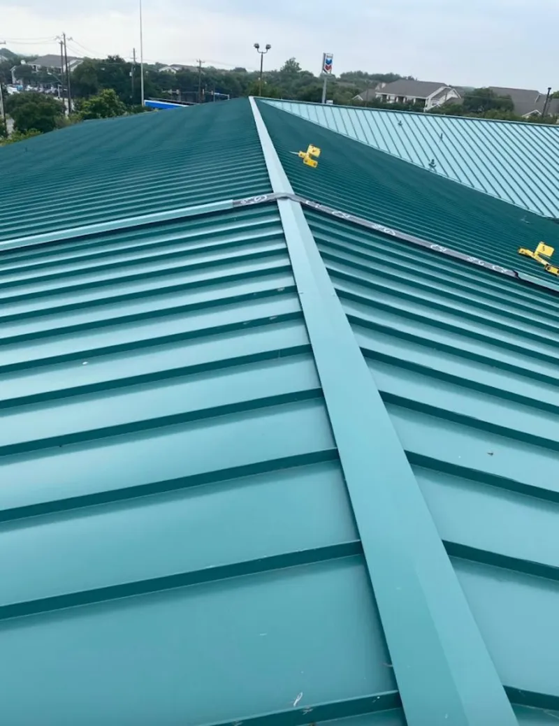 Green commercial metal roof ridge and valley for Metal Roof Repair in North Richland Hills