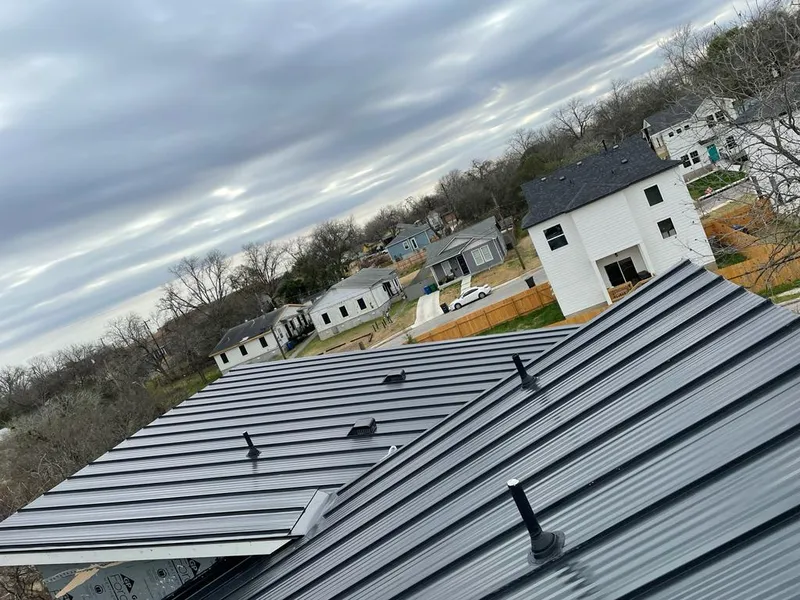 Standing seam metal roof panels with vents for Skylight Repair in North Richland Hills